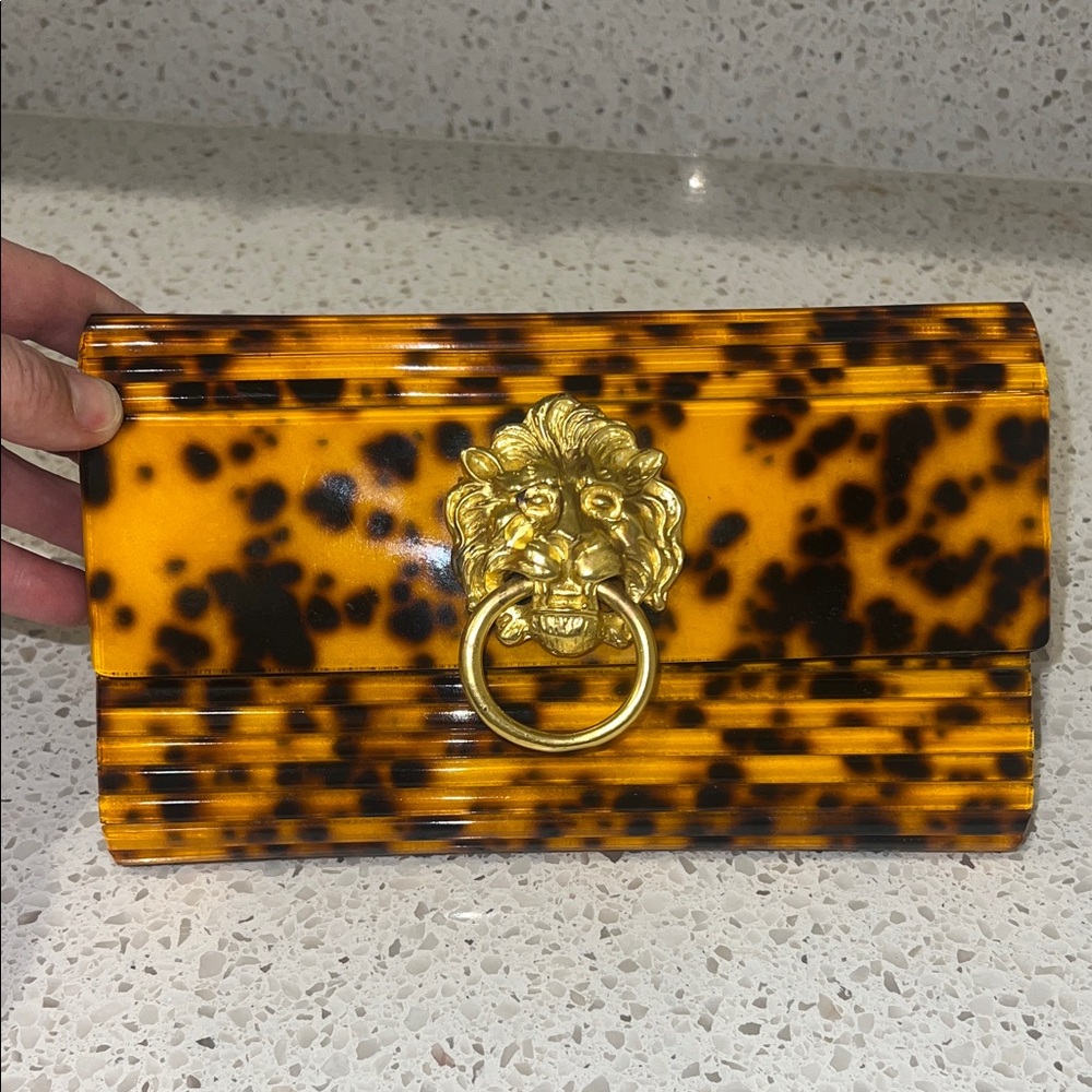 Vintage tortoise shell lion clutch